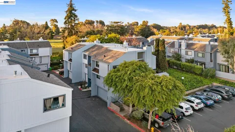 a view of a city with tall buildings