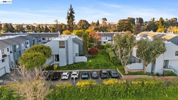 an aerial view of a house with a garden