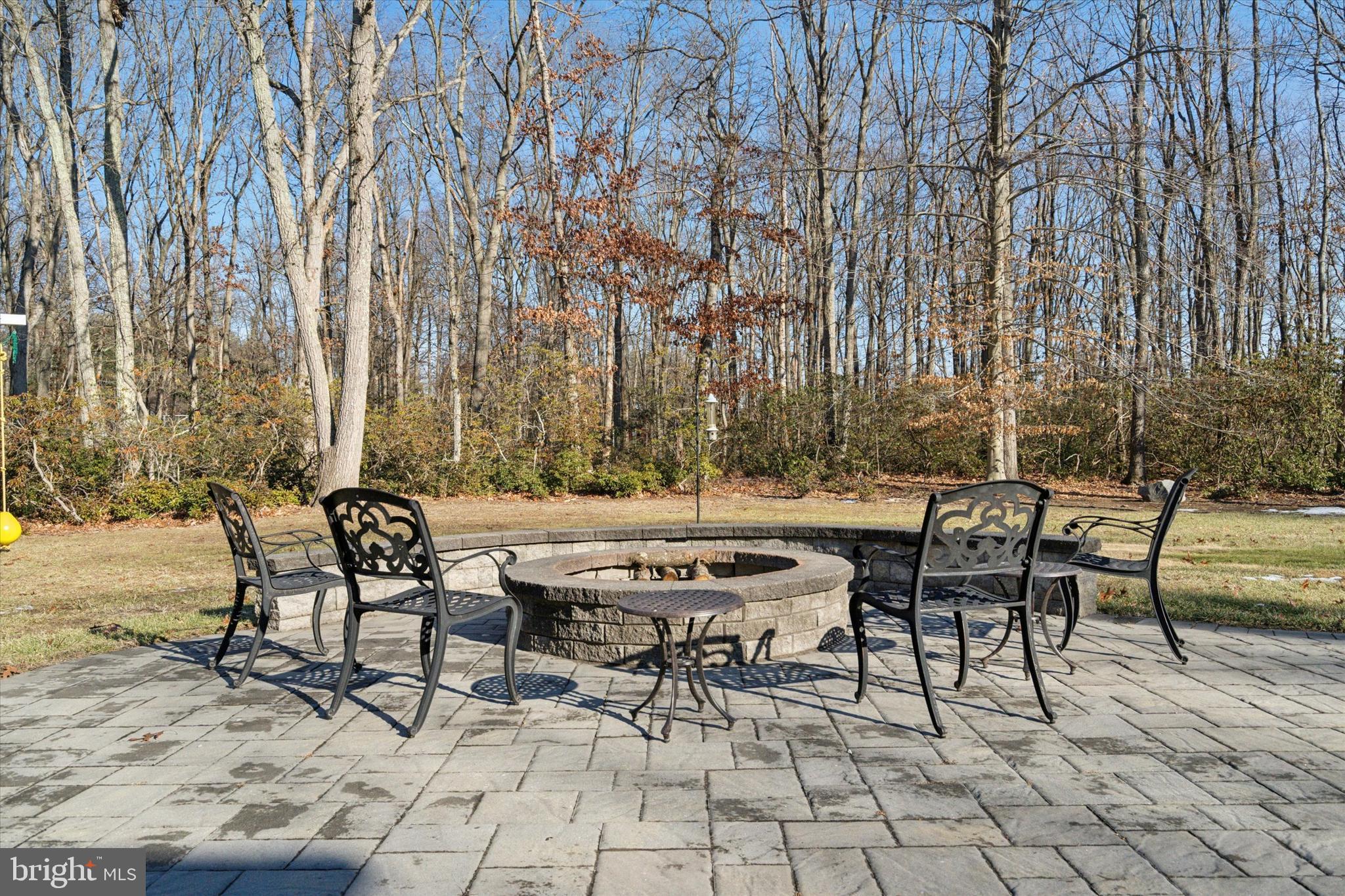 132 Hawkin Road New Egypt, NJ 08533 - Photo 30 of 42 a backyard of a house with table and chairs