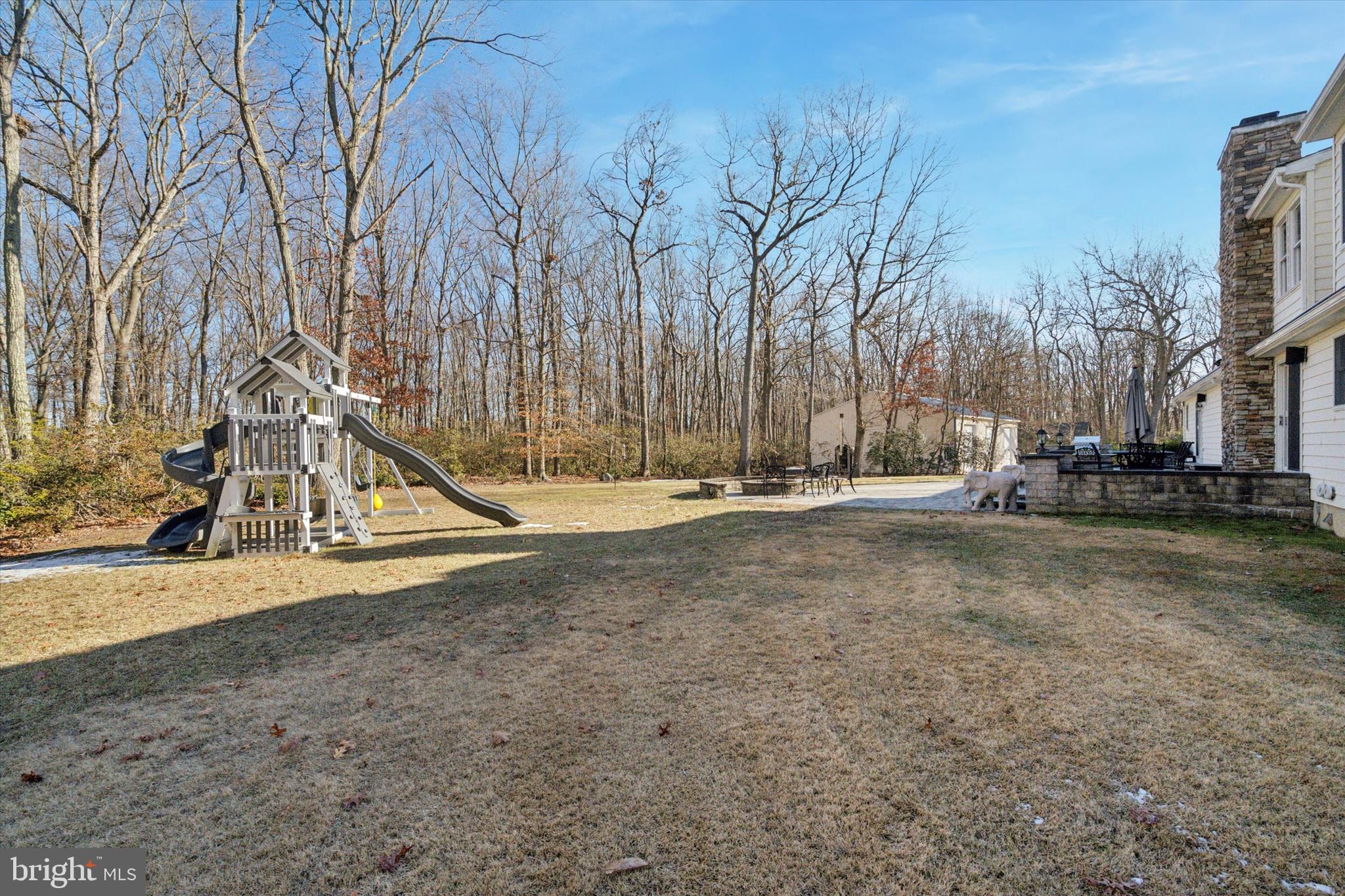 132 Hawkin Road New Egypt, NJ 08533 - Photo 34 of 42 a view of outdoor space with playground and green space