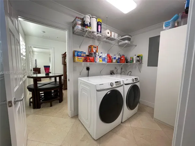 a utility room with dryer and washer