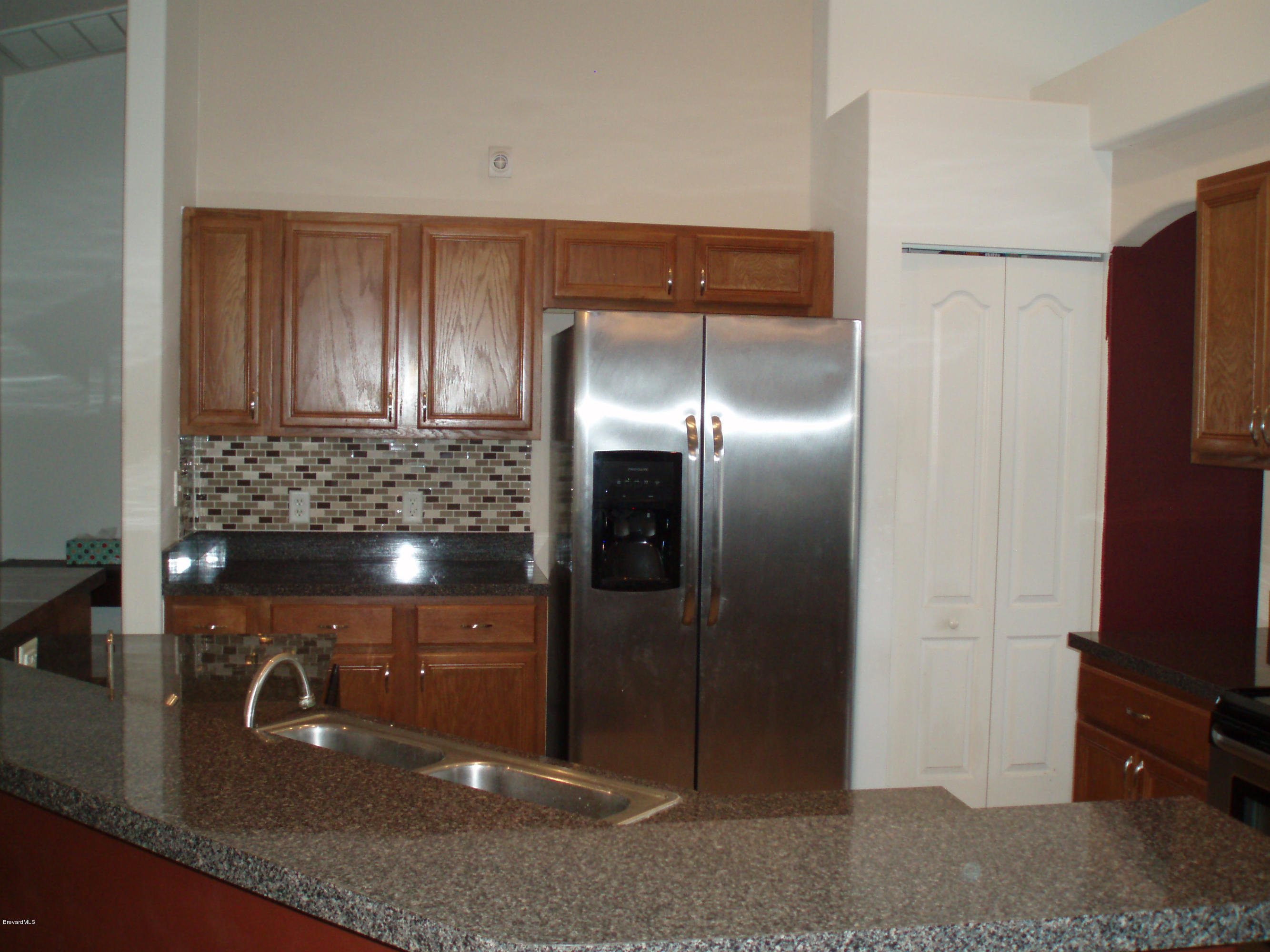 155 Haines Road Southwest Palm Bay, FL 32908 - Photo 5 of 18 Kitchen, Stainless Steel Refrigerator