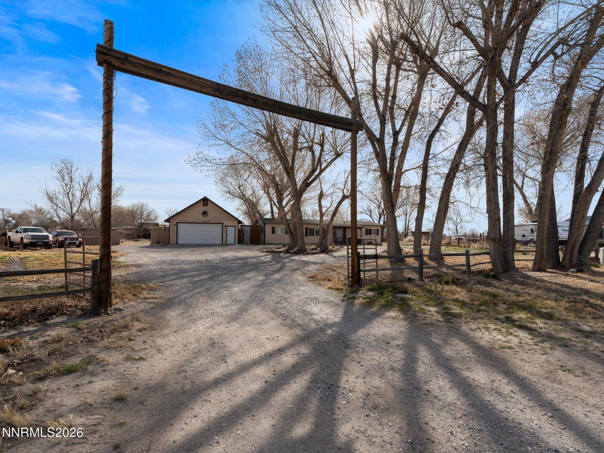 a view of backyard of the house