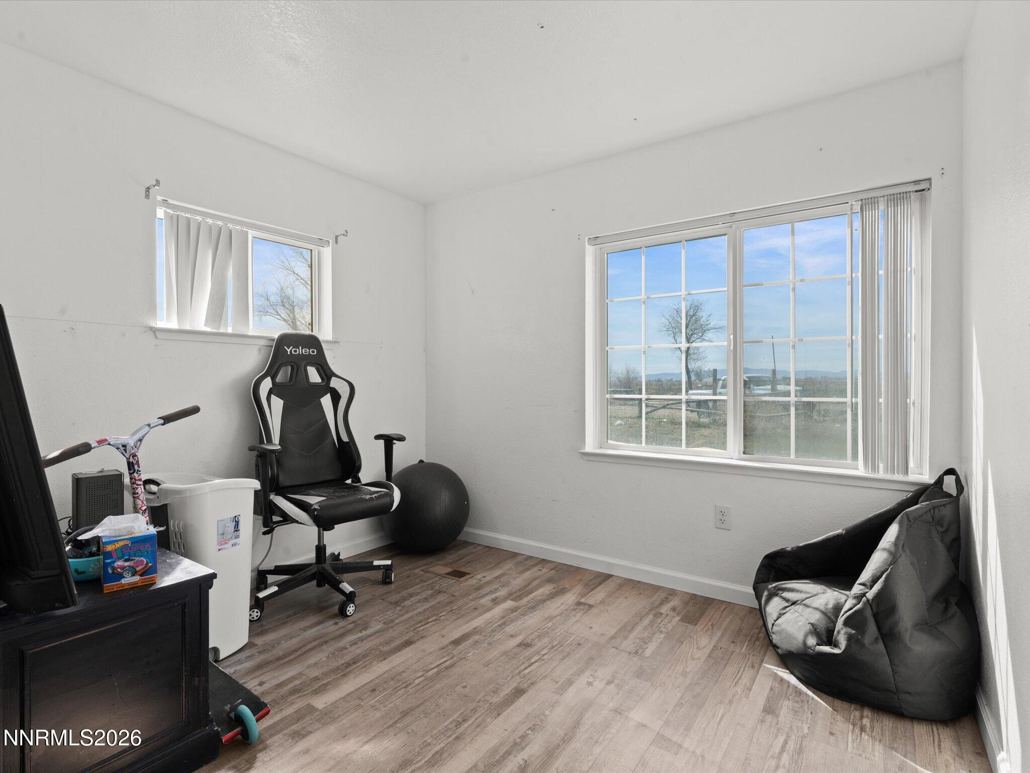 3320 Della Circle Fallon, NV 89406 - Photo 21 of 31 a view of a workspace with furniture and a window