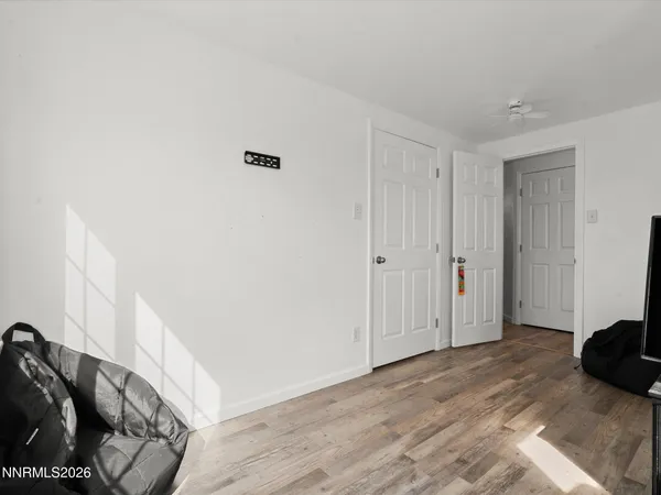 a view of a livingroom with wooden floor