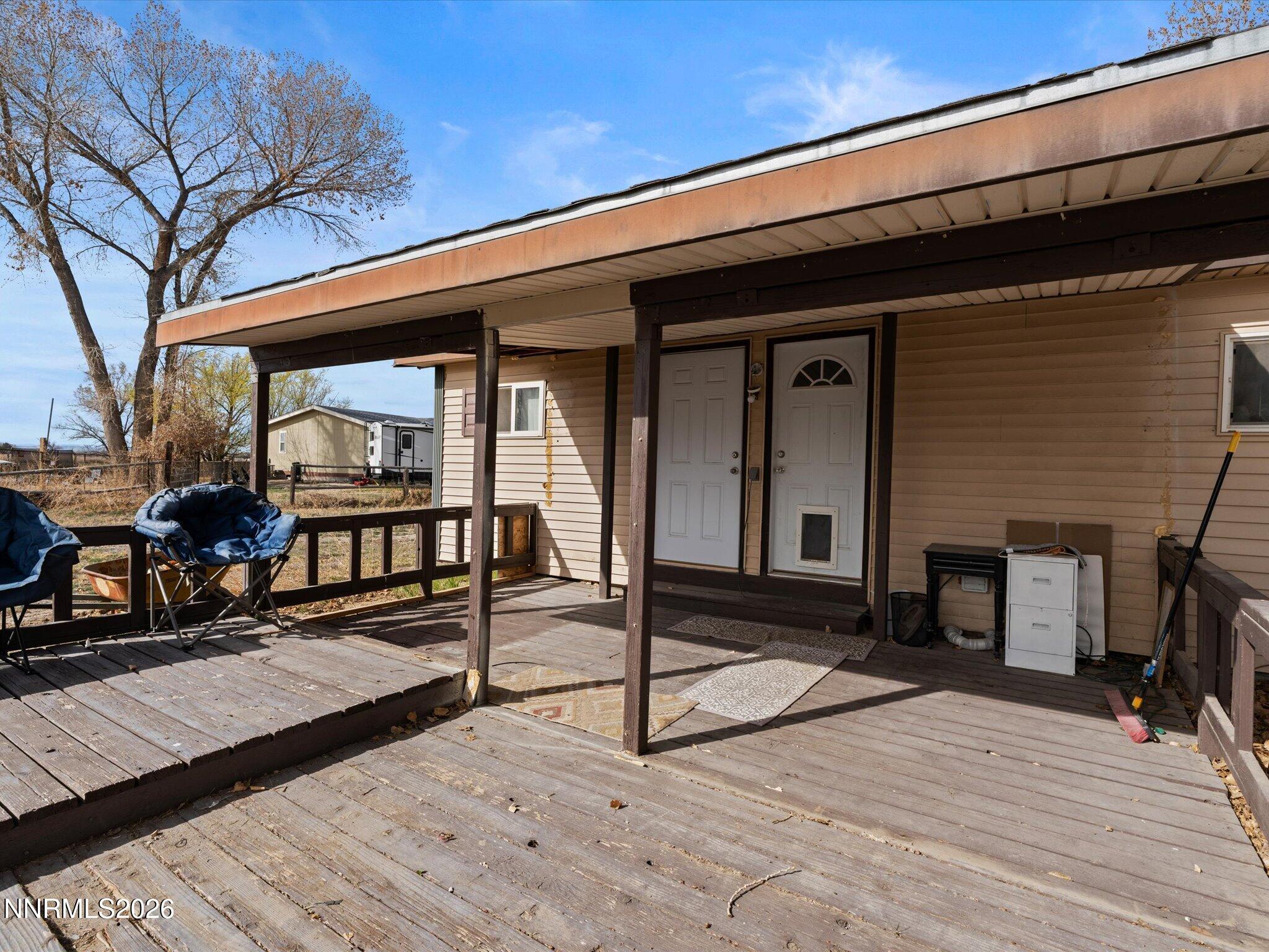 3320 Della Circle Fallon, NV 89406 - Photo 30 of 31 a view of a balcony with chairs and a potted plant