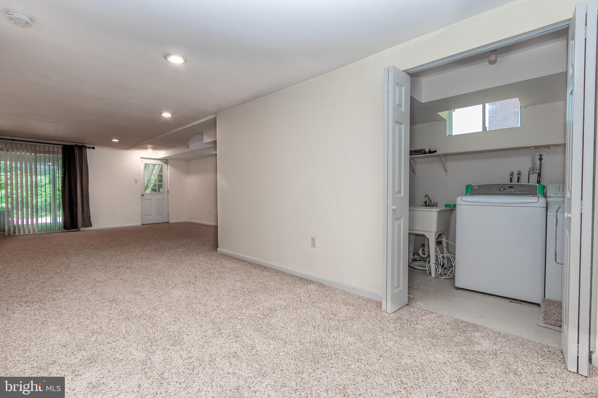 112 Longford Road West Chester, PA 19380 - Photo 27 of 27 Finished Basement with Laundry area and W/I closet