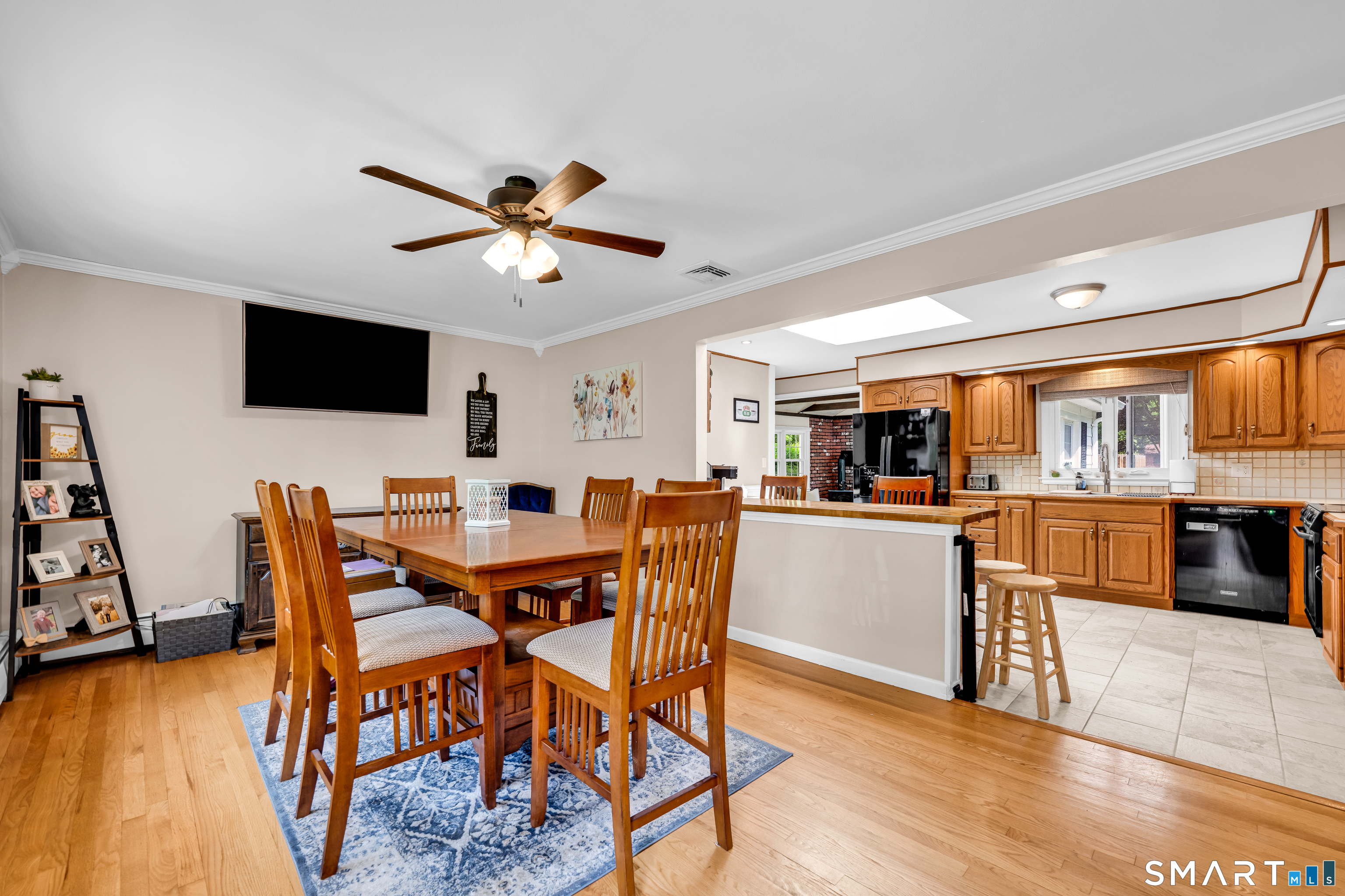 2 Hemlock Road Prospect, CT 06712 - Photo 4 of 27 a view of a dining room with furniture and wooden floor