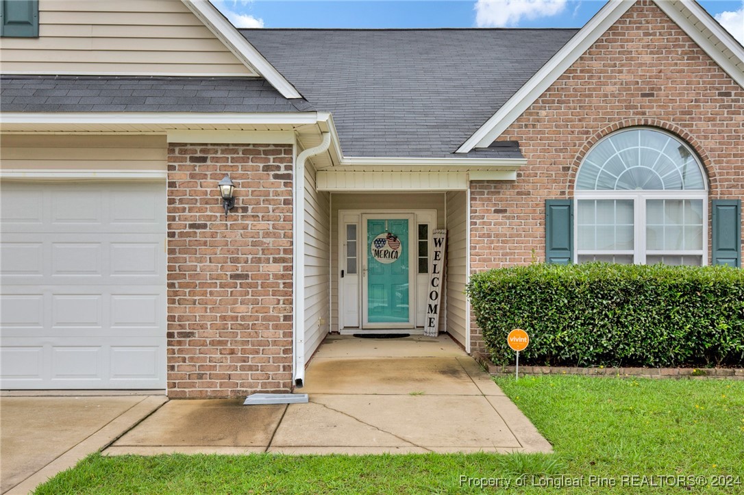 2124 Yellowbrick Road Fayetteville, NC 28314 - Photo 2 of 30 a front view of a house with a yard