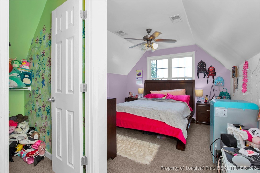 2124 Yellowbrick Road Fayetteville, NC 28314 - Photo 27 of 30 a bedroom with a bed and a window