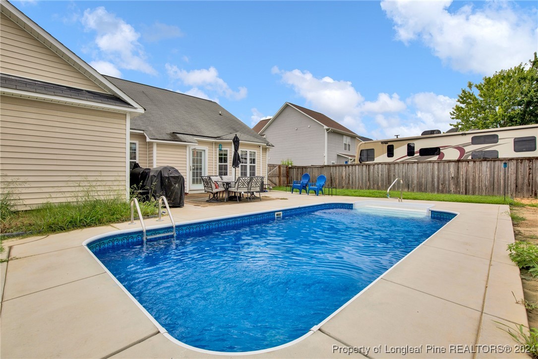 2124 Yellowbrick Road Fayetteville, NC 28314 - Photo 29 of 30 a view of a swimming pool with a patio