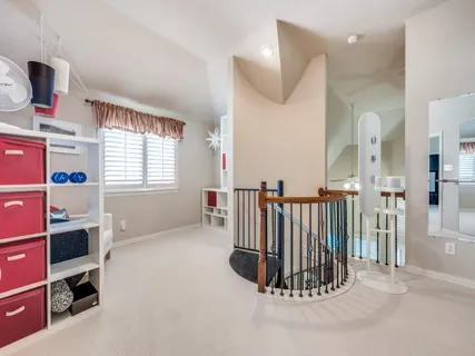 a view of livingroom with furniture and windows
