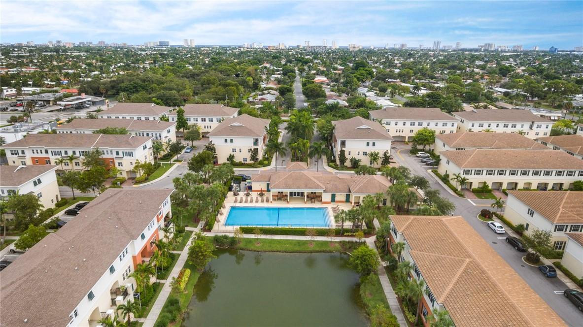 710 Southwest 1st Way Pompano Beach, FL 33060 - Photo 11 of 38 an aerial view of lake and residential houses with outdoor space