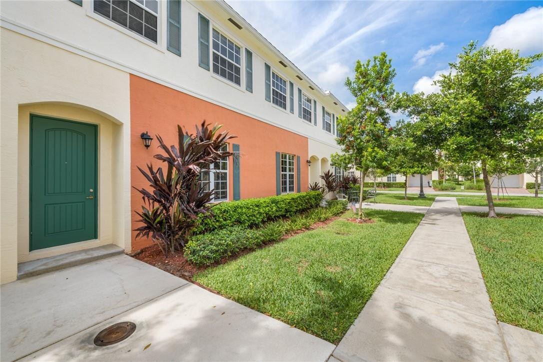 710 Southwest 1st Way Pompano Beach, FL 33060 - Photo 12 of 38 a front view of a house with a yard and trees