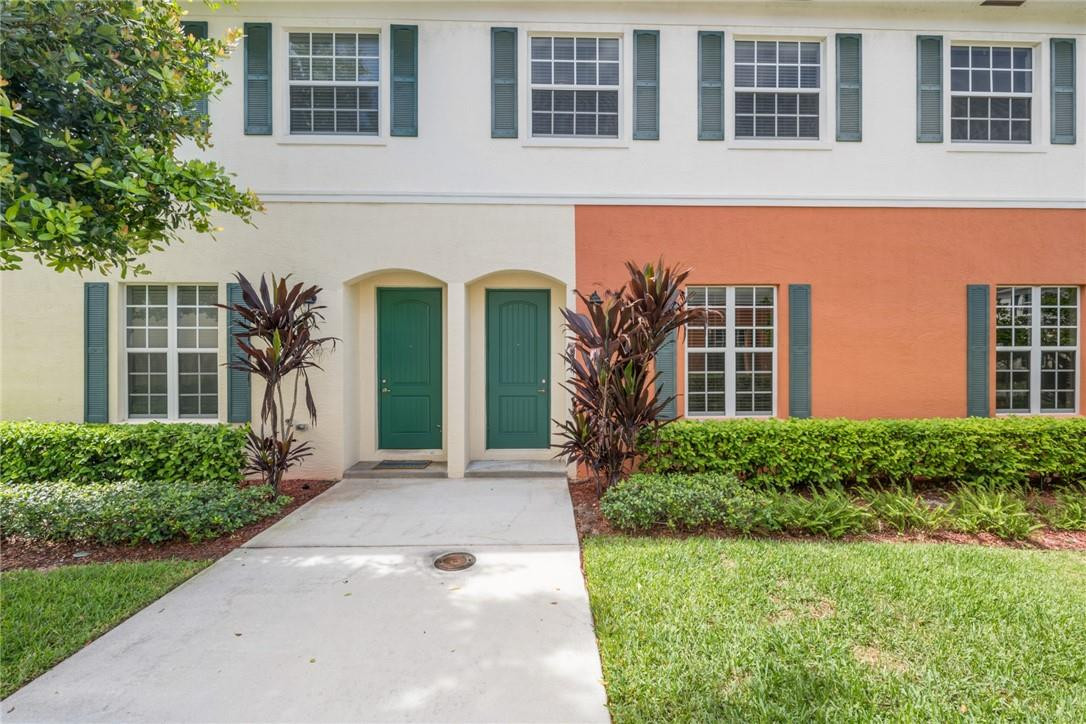 710 Southwest 1st Way Pompano Beach, FL 33060 - Photo 13 of 38 a front view of a house with a yard