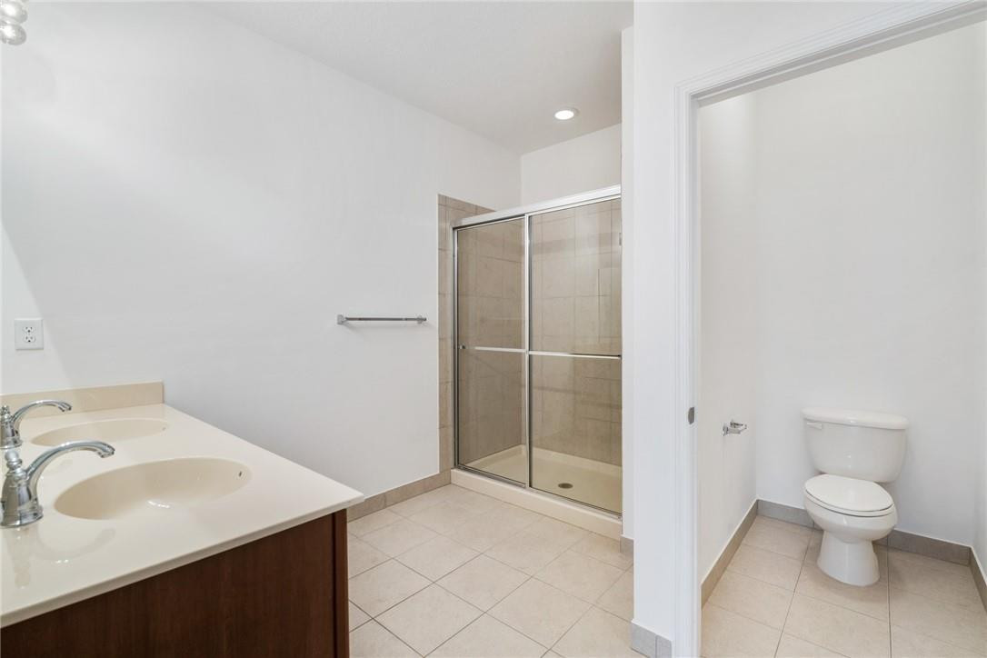 710 Southwest 1st Way Pompano Beach, FL 33060 - Photo 28 of 38 a bathroom with a sink toilet and shower