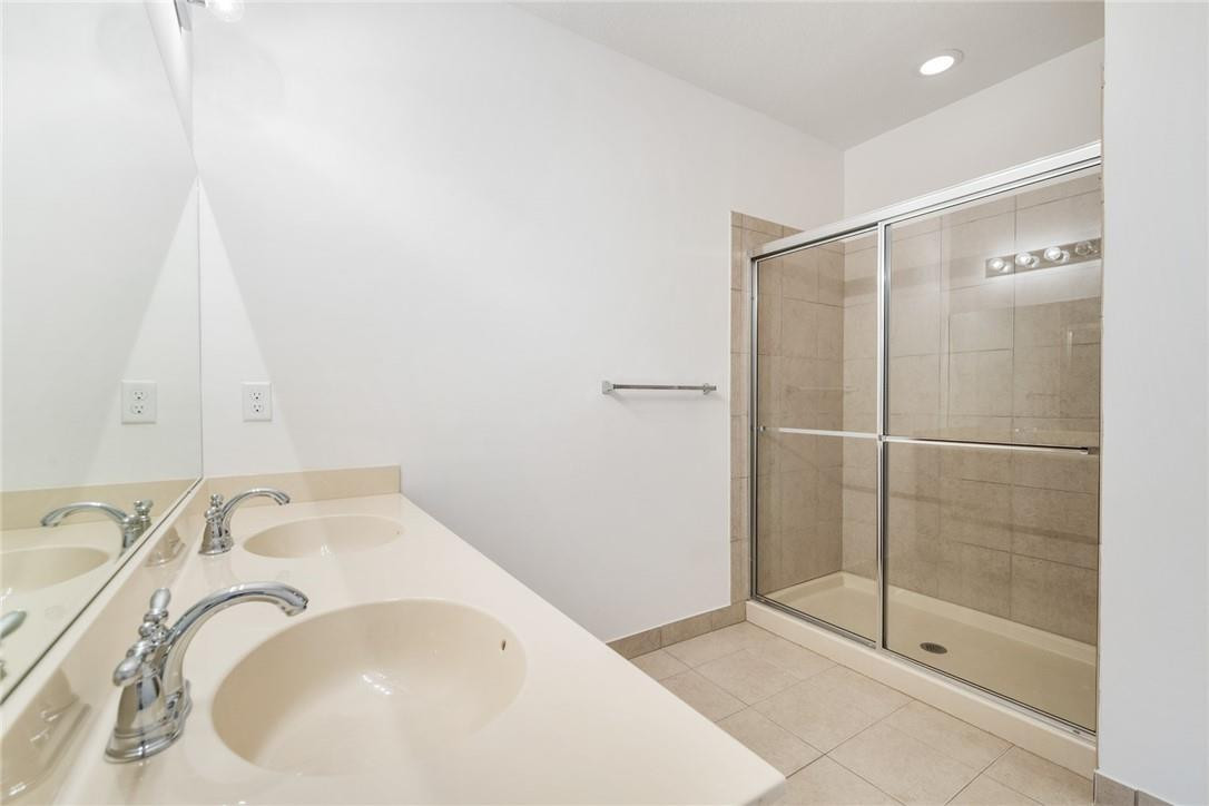 710 Southwest 1st Way Pompano Beach, FL 33060 - Photo 30 of 38 a bathroom with a sink and a shower