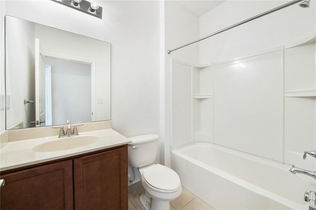 710 Southwest 1st Way Pompano Beach, FL 33060 - Photo 32 of 38 a bathroom with a sink a toilet and shower