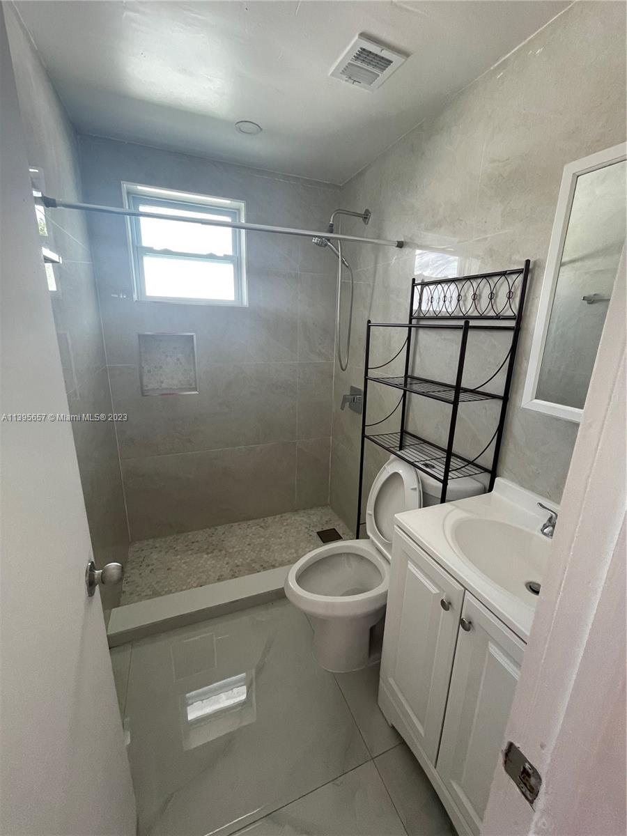 685 East 9th Lane Hialeah, FL 33010 - Photo 18 of 47 a bathroom with a sink toilet and shower