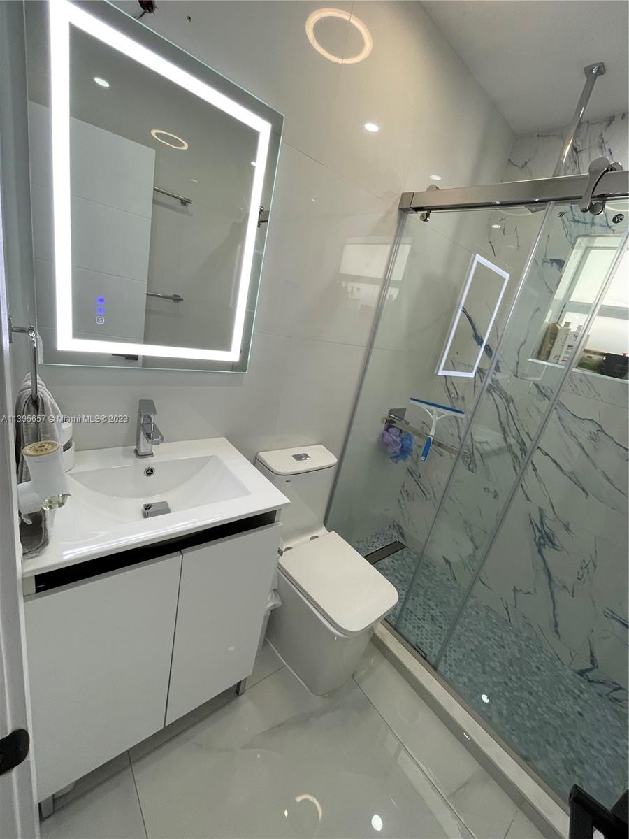 685 East 9th Lane Hialeah, FL 33010 - Photo 36 of 47 a bathroom with a sink toilet and shower