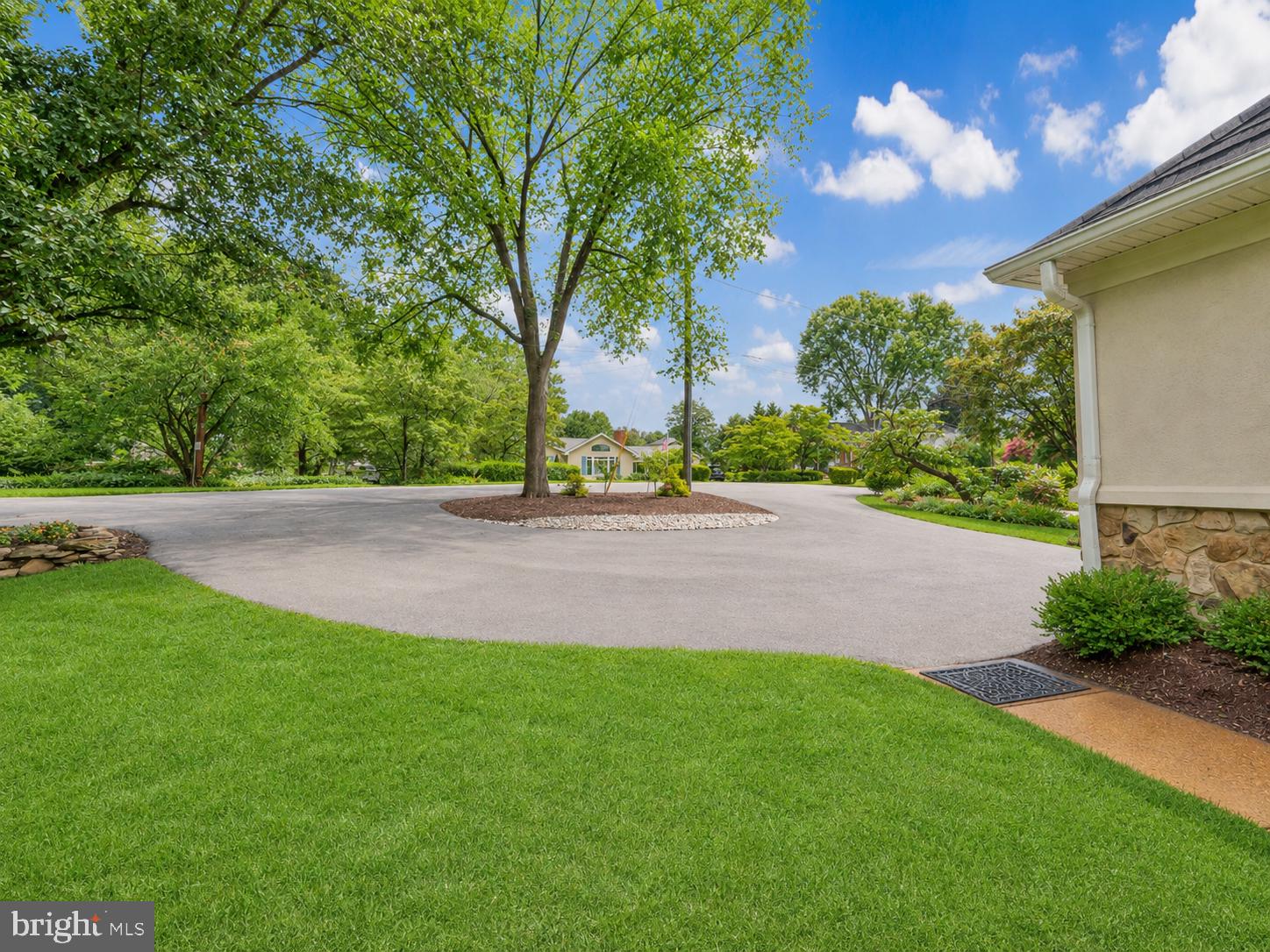 6732 Churchill Road McLean, VA 22101 - Photo 70 of 71 Lush greenery surrounds a winding drive.