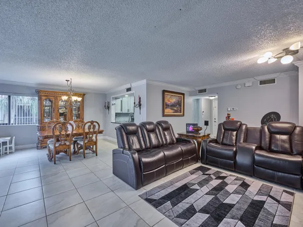 a living room with furniture and a couch