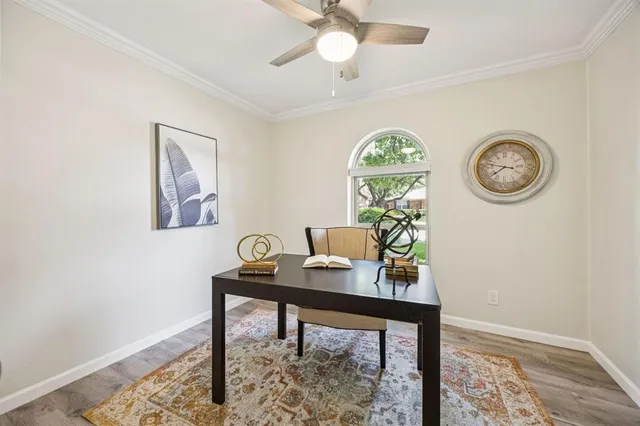 a workspace with furniture and a window