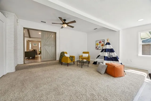 a room with gym equipment and a window