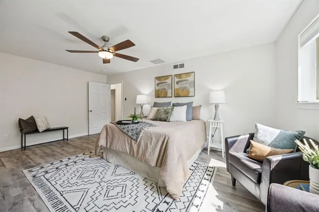 a bed room with a bed and a couch