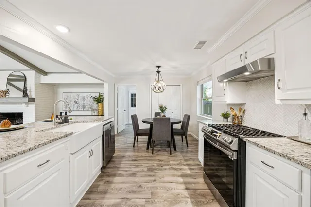 a kitchen with granite countertop lots of counter top space