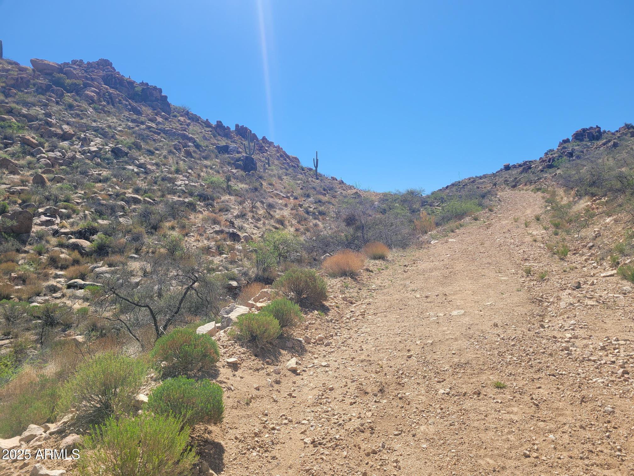 0 South Date Creek Road, Unit I1 Congress, AZ 85332 - Photo 4 of 7 a view of a dry yard with mountains in the background