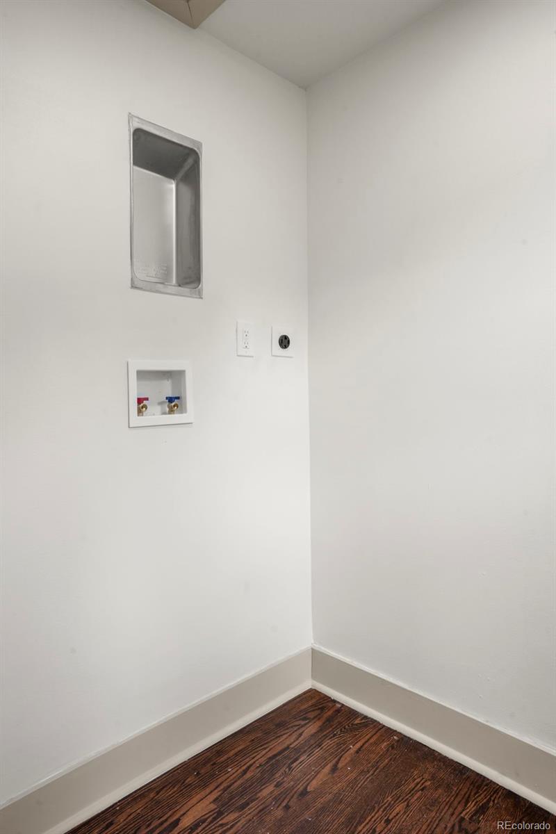 809 Forest Street Denver, CO 80220 - Photo 13 of 15 a view of a small space with wooden floor