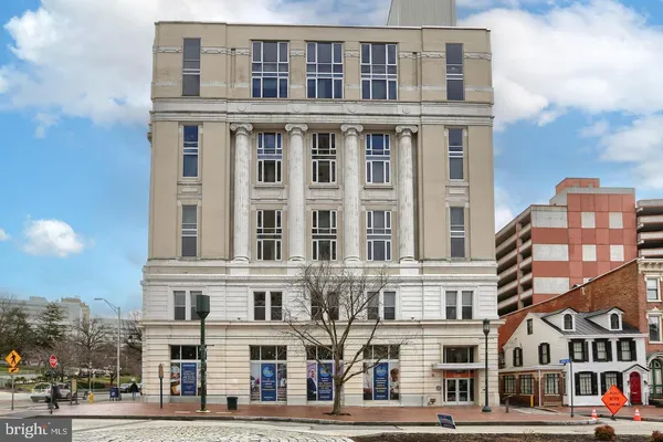 a front view of a multi story building