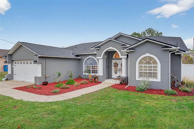 a front view of a house with entertaining space
