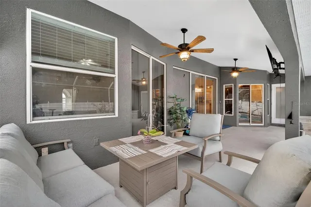 an aerial view of a houses with a lot of trees