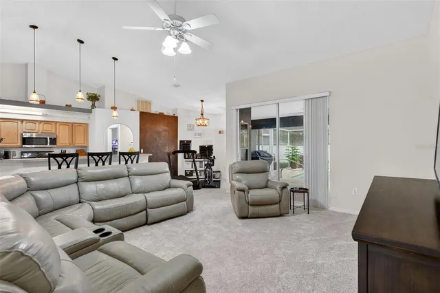 a view of a workspace with furniture