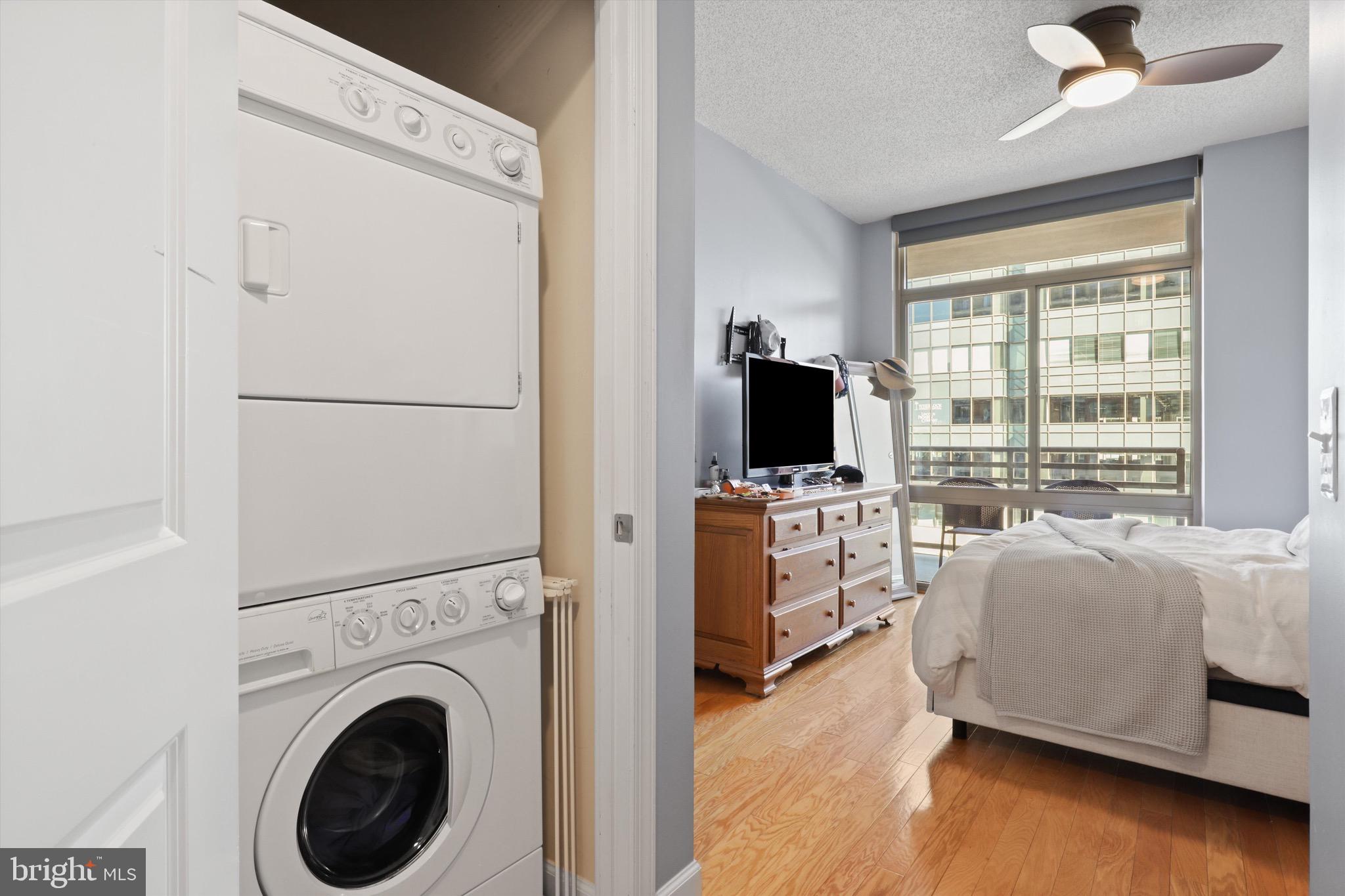 3600 South Glebe Road, Unit 414W Arlington, VA 22202 - Photo 17 of 60 a view of bedroom with workspace and a window