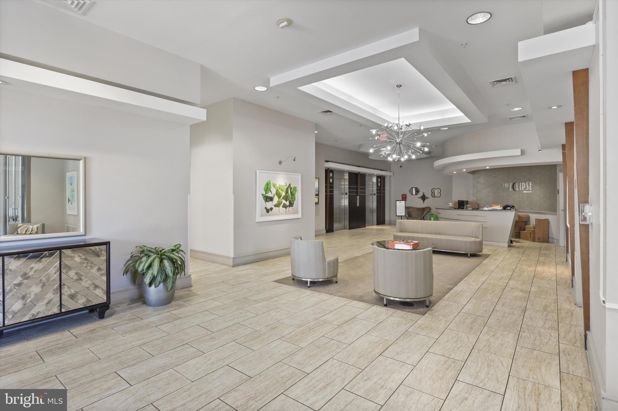 3600 South Glebe Road, Unit 414W Arlington, VA 22202 - Photo 27 of 60 a room with lots of potted plants and white walls