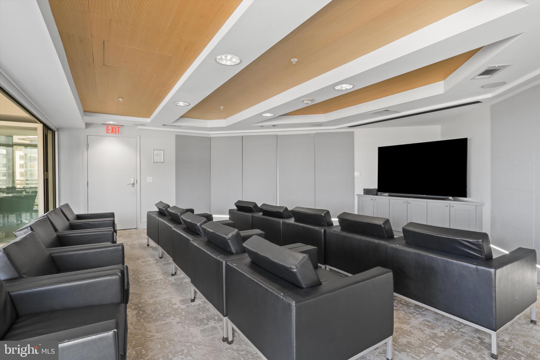 3600 South Glebe Road, Unit 414W Arlington, VA 22202 - Photo 53 of 60 a living room with furniture and a flat screen tv