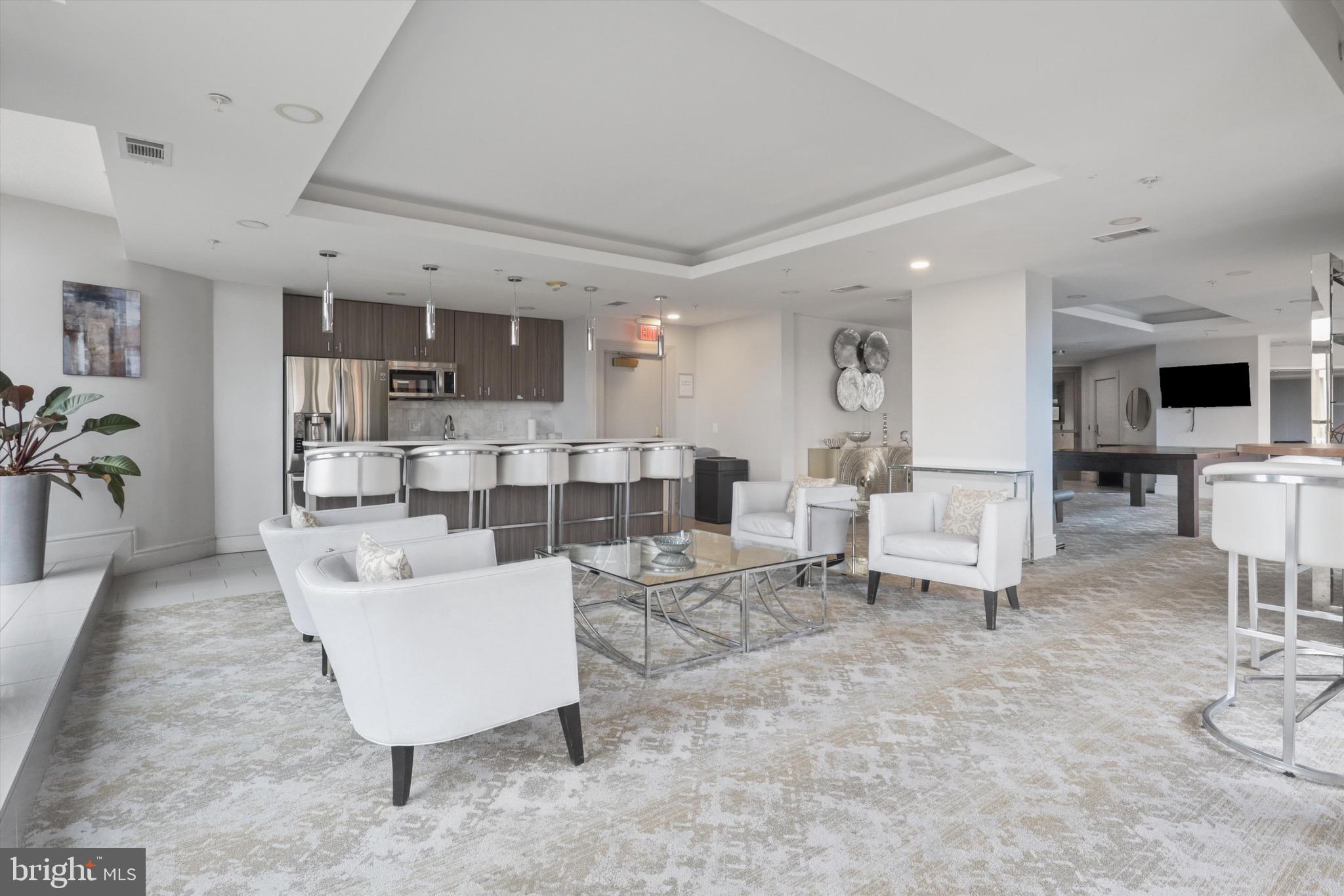 3600 South Glebe Road, Unit 414W Arlington, VA 22202 - Photo 54 of 60 a living room with furniture and a flat screen tv