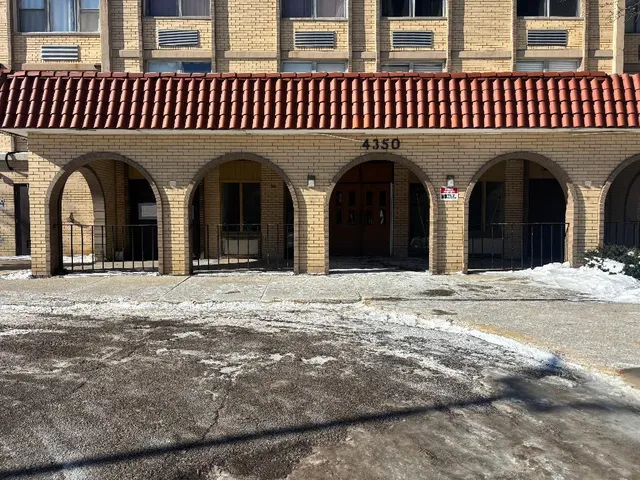 a view of a hall with an entryway
