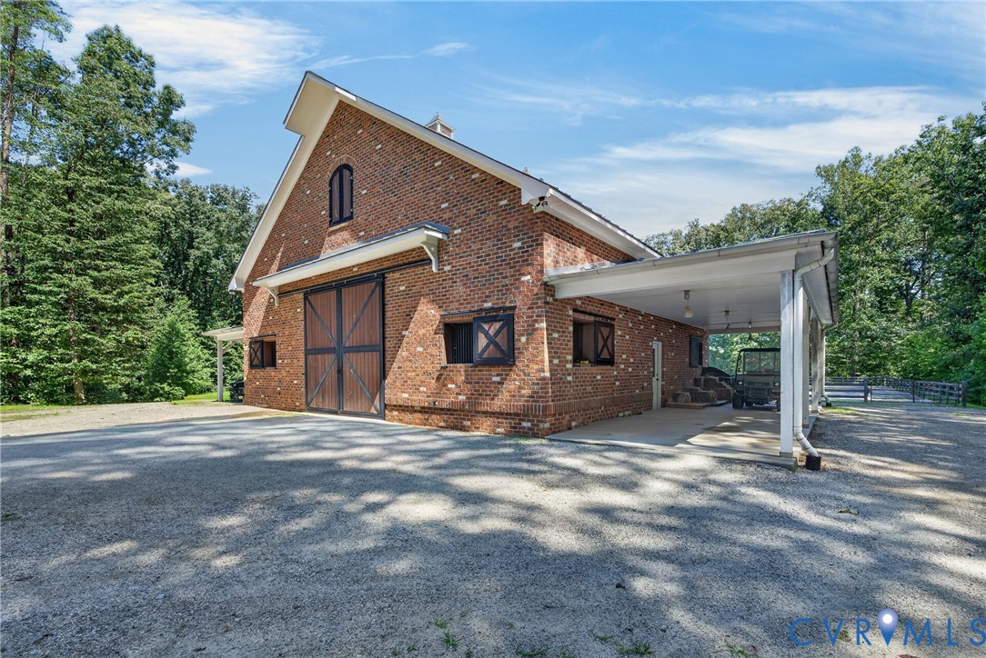 1108 Shallow Well Road Manakin-Sabot, VA 23103 - Photo 70 of 86 Brick exterior barn structure featuring large slid