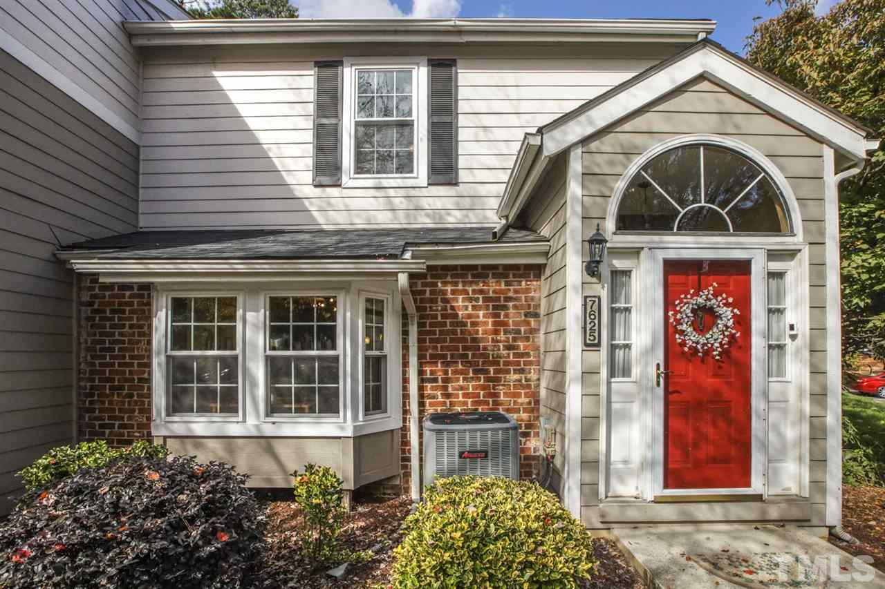 a front view of a house with a porch