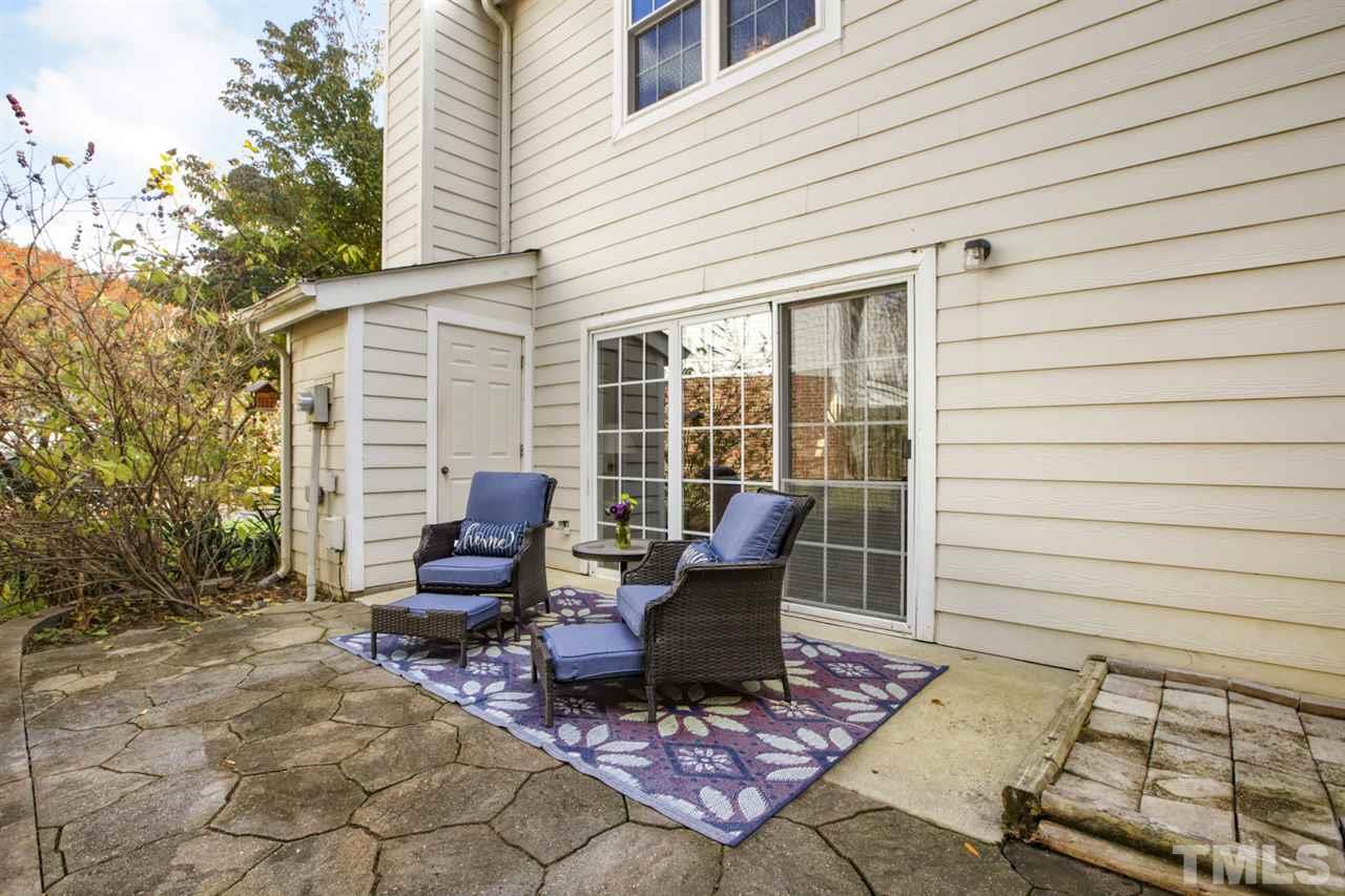 7625 Falcon Rest Circle, Unit 7625 Raleigh, NC 27615 - Photo 23 of 29 a view of a chairs in back of the house