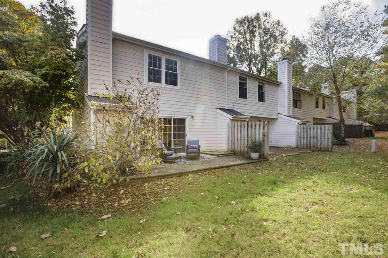 7625 Falcon Rest Circle, Unit 7625 Raleigh, NC 27615 - Photo 25 of 29 a view of a house with backyard and sitting area
