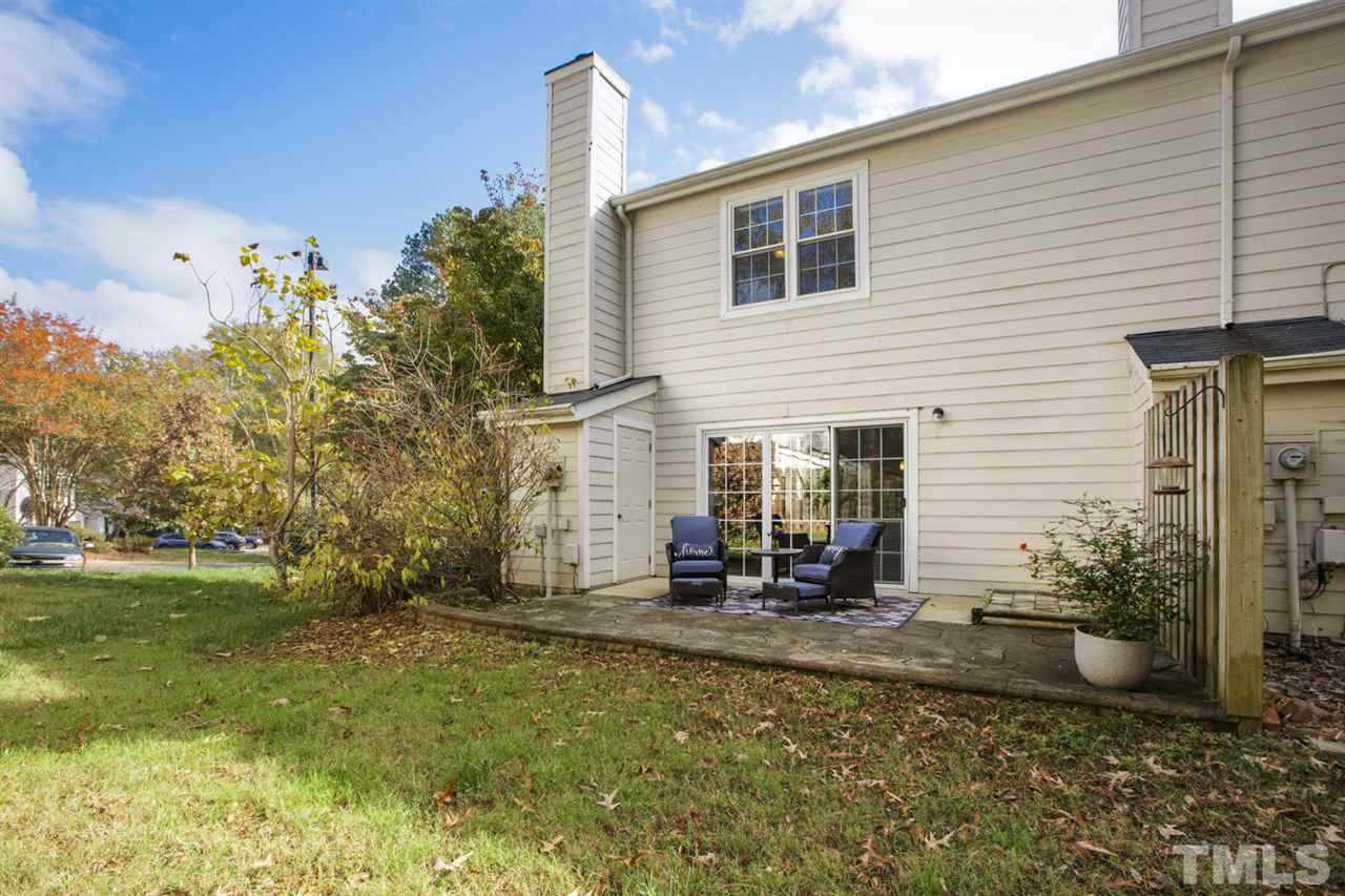 7625 Falcon Rest Circle, Unit 7625 Raleigh, NC 27615 - Photo 26 of 29 a view of a house with backyard and sitting area