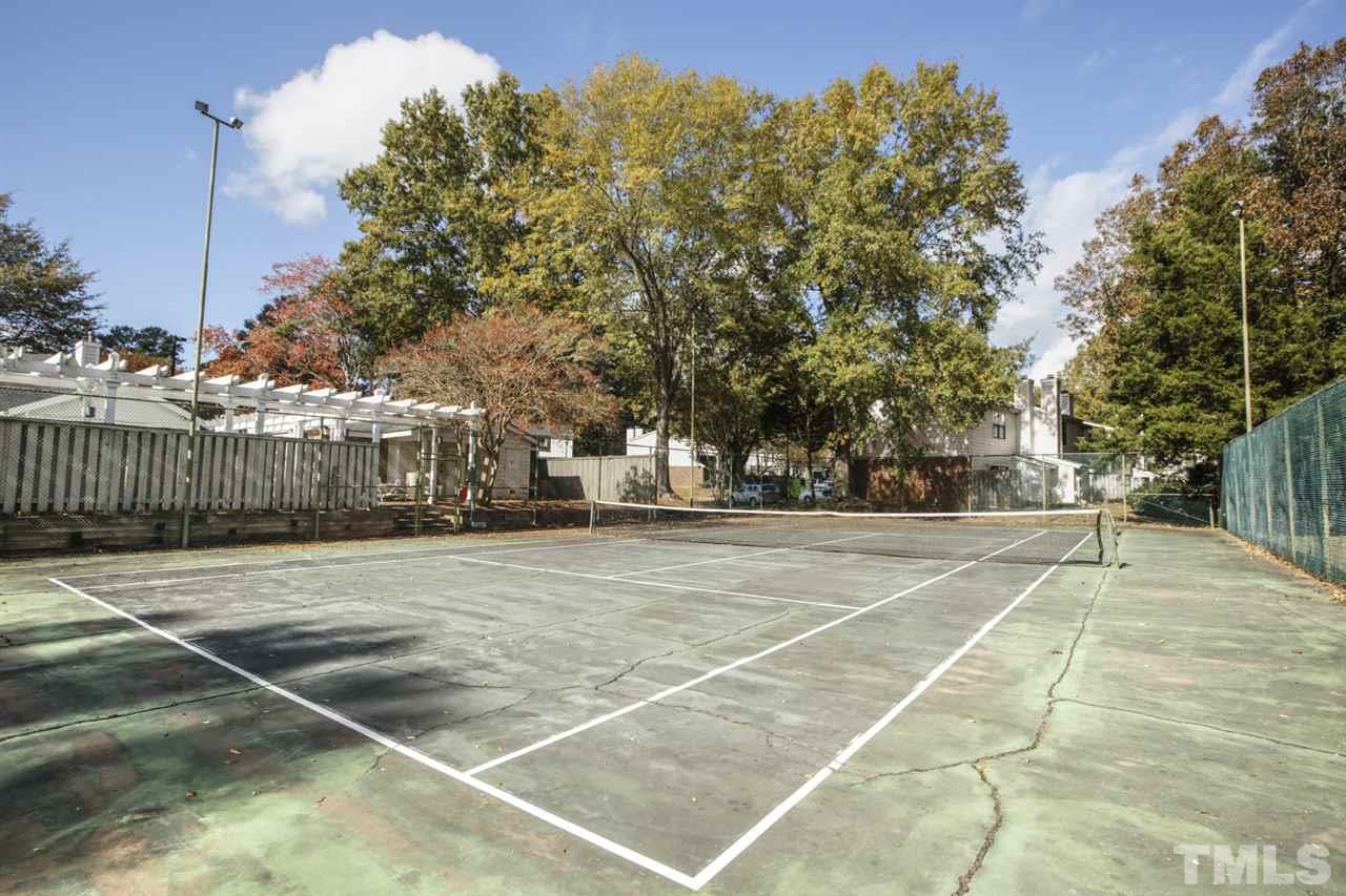 7625 Falcon Rest Circle, Unit 7625 Raleigh, NC 27615 - Photo 28 of 29 a view of a tennis court