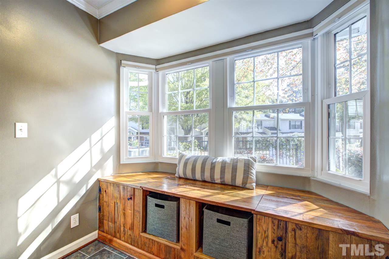 7625 Falcon Rest Circle, Unit 7625 Raleigh, NC 27615 - Photo 6 of 29 a view of a kitchen with a sink and large window