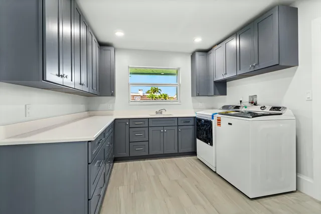 a spacious bedroom with a large bed and a couch