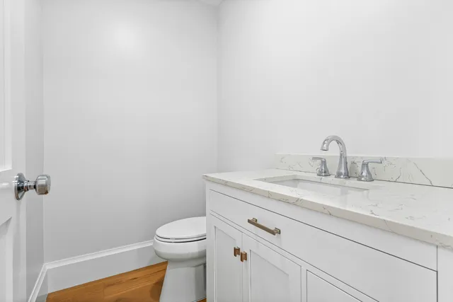 a view of a house with a yard patio and sitting area